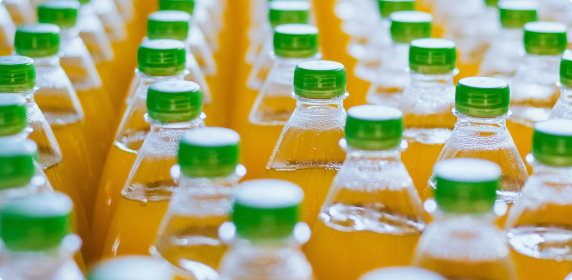 Bottled beverages on a production line for Product Carbon Footprint assessment